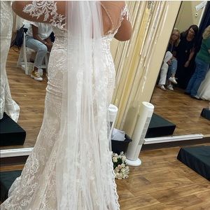 Beautiful wedding dress NWT (only worn once to try on) $900, perfect condition.